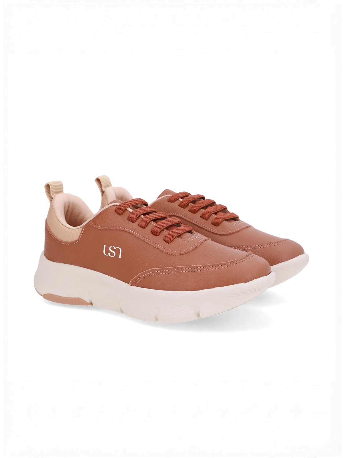 TENIS EM COURO