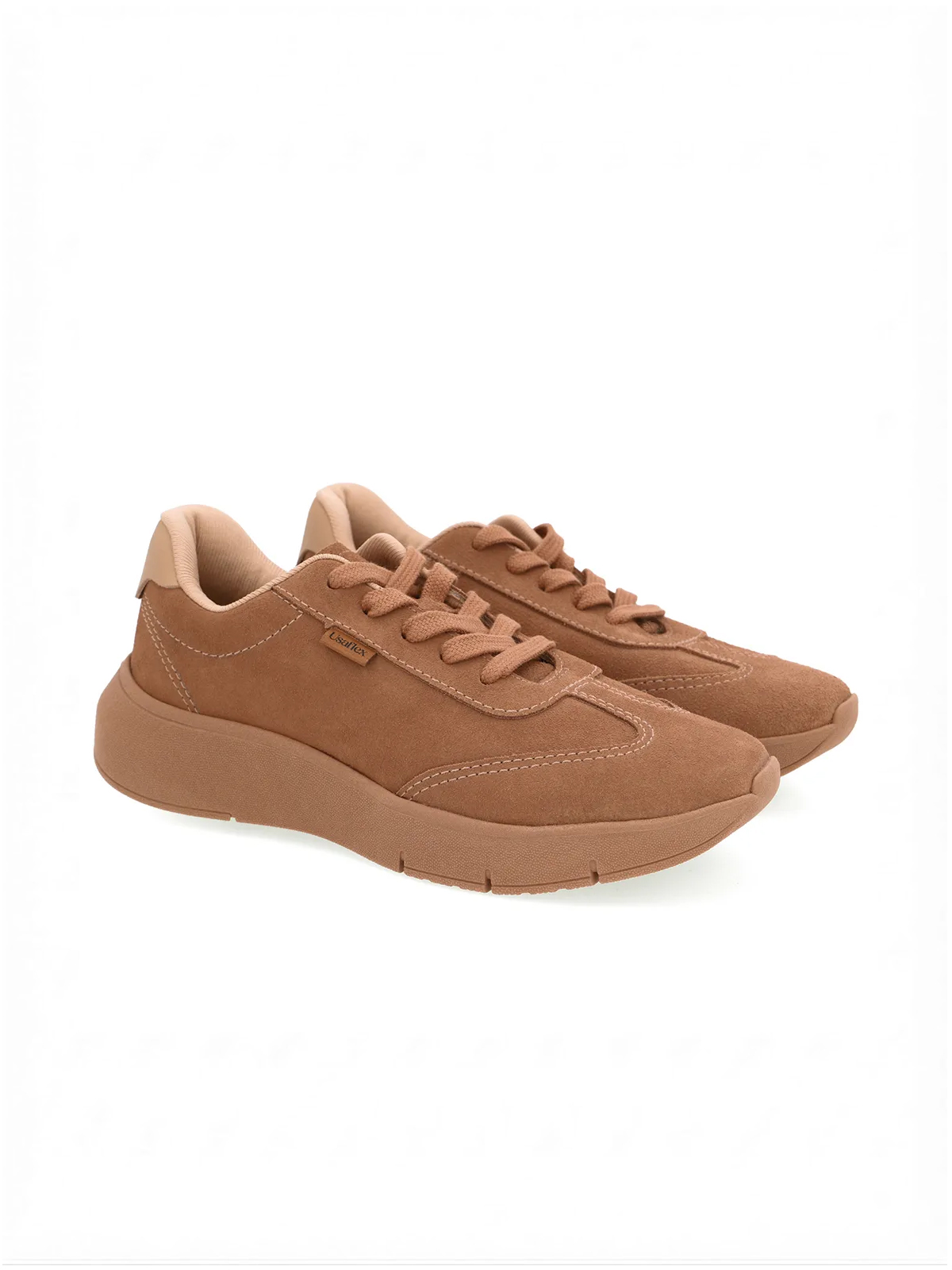 TENIS EM COURO